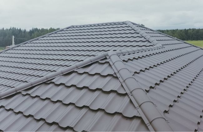 Freshly painted tiled roof in Sydney after a professional roof painting service Freshly painted tiled roof in Sydney after a professional roof painting service