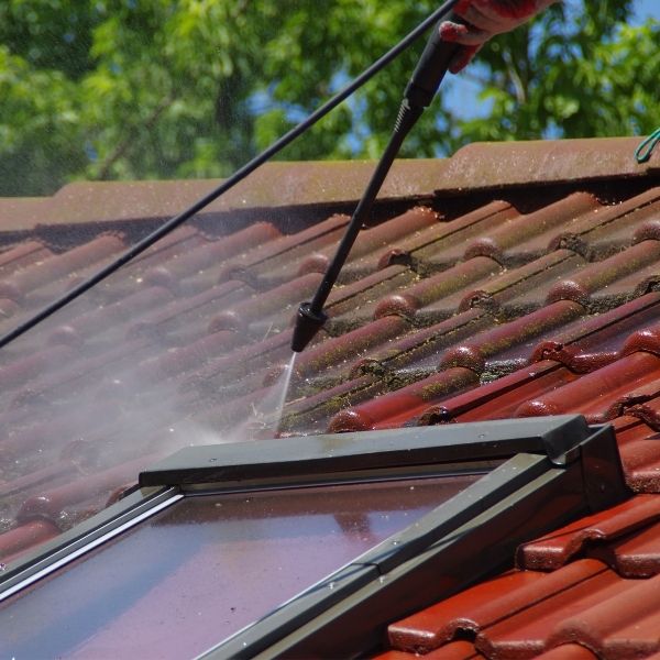 High-pressure roof cleaning in Sydney removing moss and mould from terracotta roof tiles High-pressure roof cleaning in Sydney removing moss and mould from terracotta roof tiles