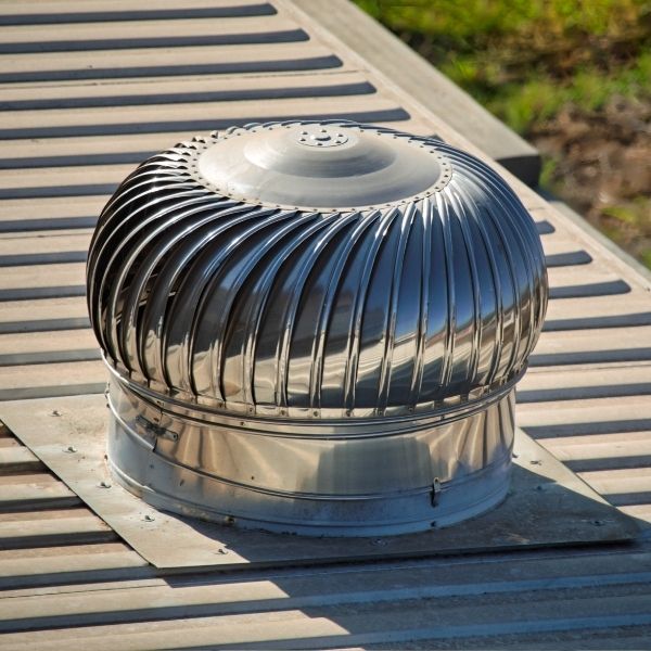 Roofing Guys Sydney whirlybird installation service on a metal roof for better ventilation